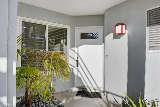 an aerial view of residential house with outdoor space and trees all around
