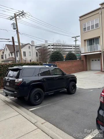 a car parked in front of a building