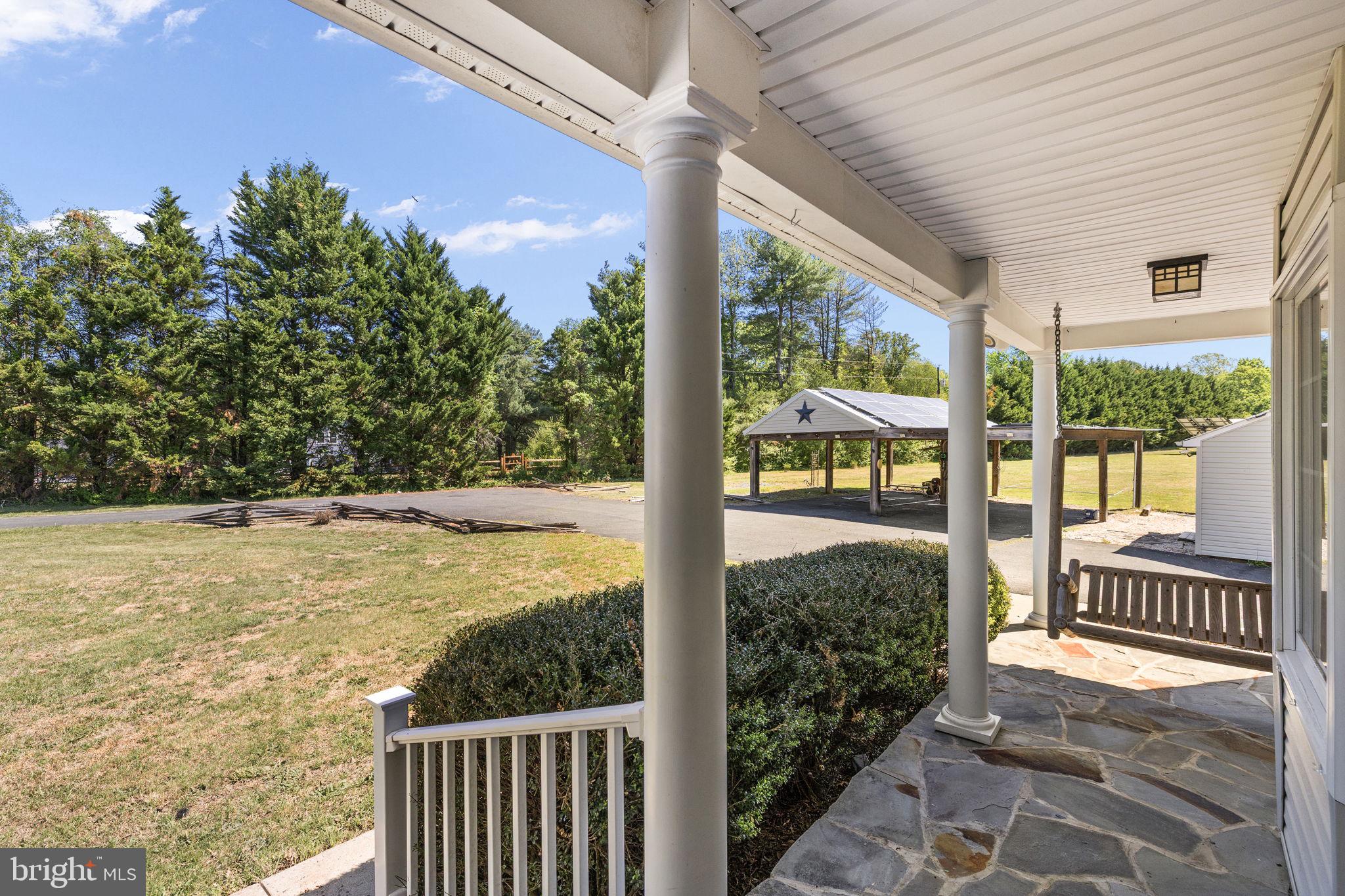 12615 Post Oak Road Spotsylvania, VA 22551 - Photo 3 of 67 Charming porch with serene views.