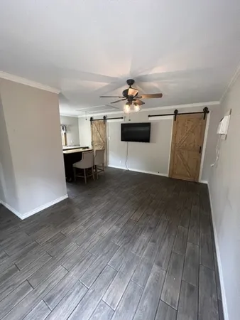a view of livingroom with furniture and wooden floor