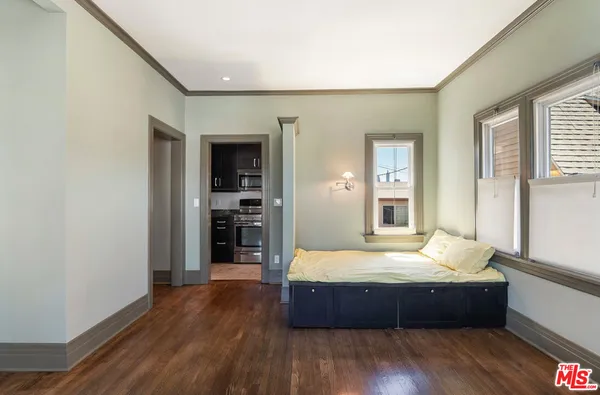 a room with bed and window