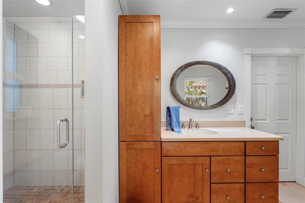 101 Osceola Road Belleair, FL 33756 - Photo 18 of 33 a bathroom with a sink and a mirror