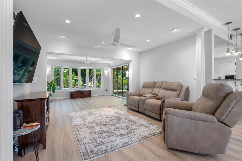 101 Osceola Road Belleair, FL 33756 - Photo 19 of 33 a living room with furniture and a large window