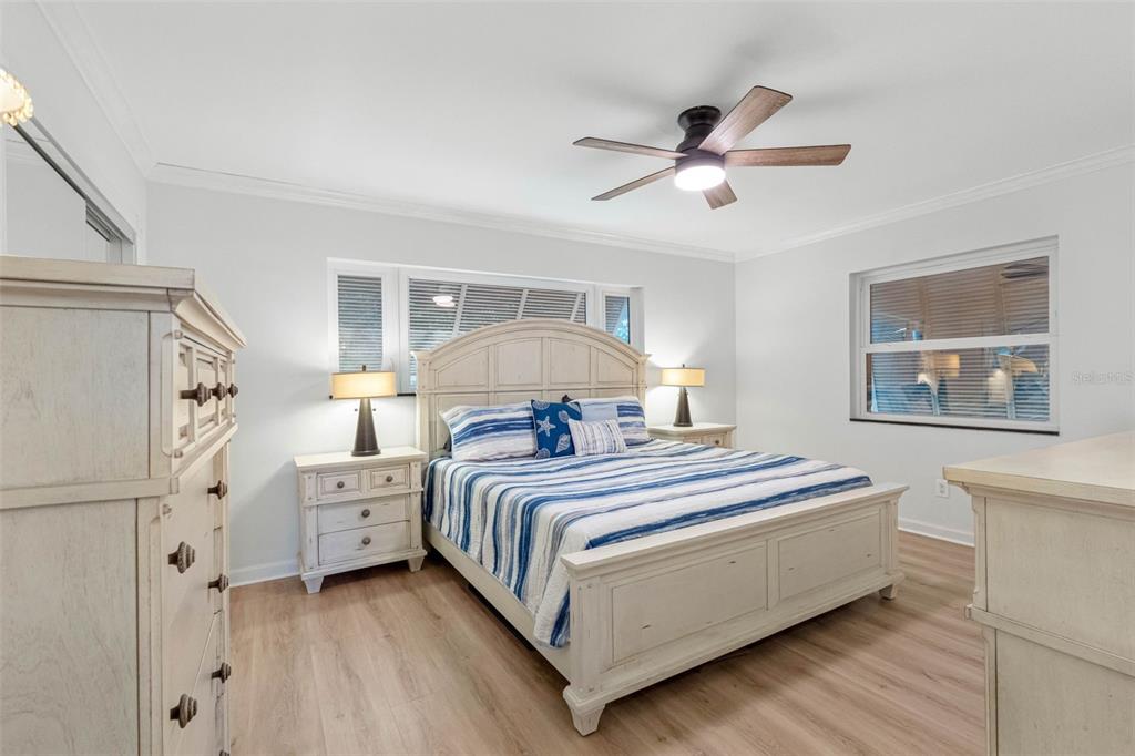 101 Osceola Road Belleair, FL 33756 - Photo 27 of 33 a bedroom with bed and window