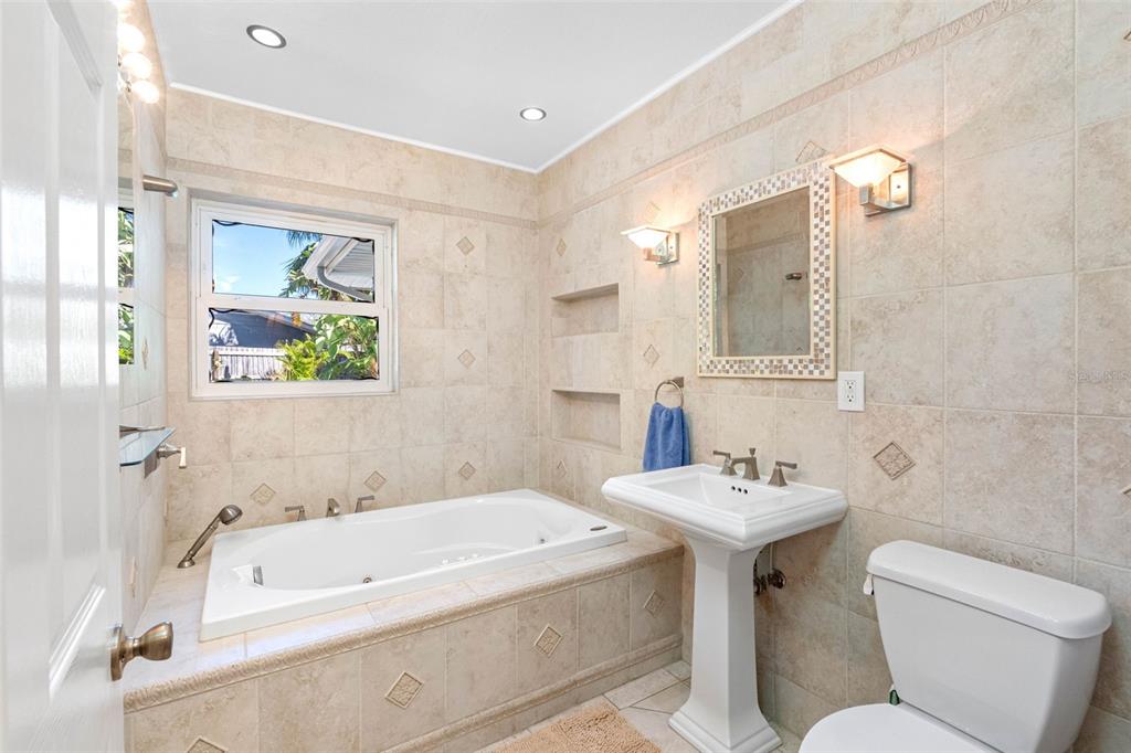 101 Osceola Road Belleair, FL 33756 - Photo 29 of 33 a bathroom with a sink and a mirror