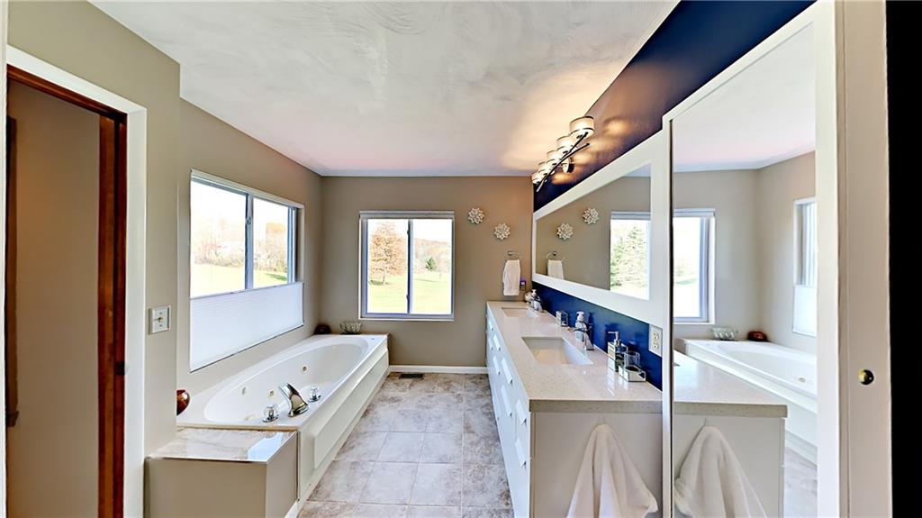 5766 Evans Road Export, PA 15632 - Photo 13 of 25 Renovated bath with jet tub and dual bowl vanity.