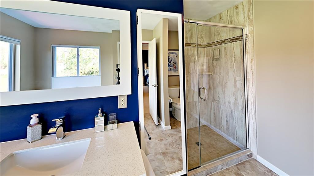 5766 Evans Road Export, PA 15632 - Photo 14 of 25 Tile shower with glass door.