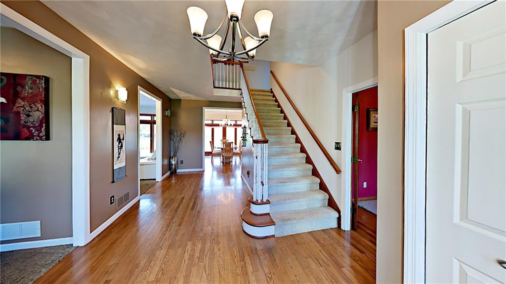 5766 Evans Road Export, PA 15632 - Photo 3 of 25 Center hall entry flanked by living room and den.