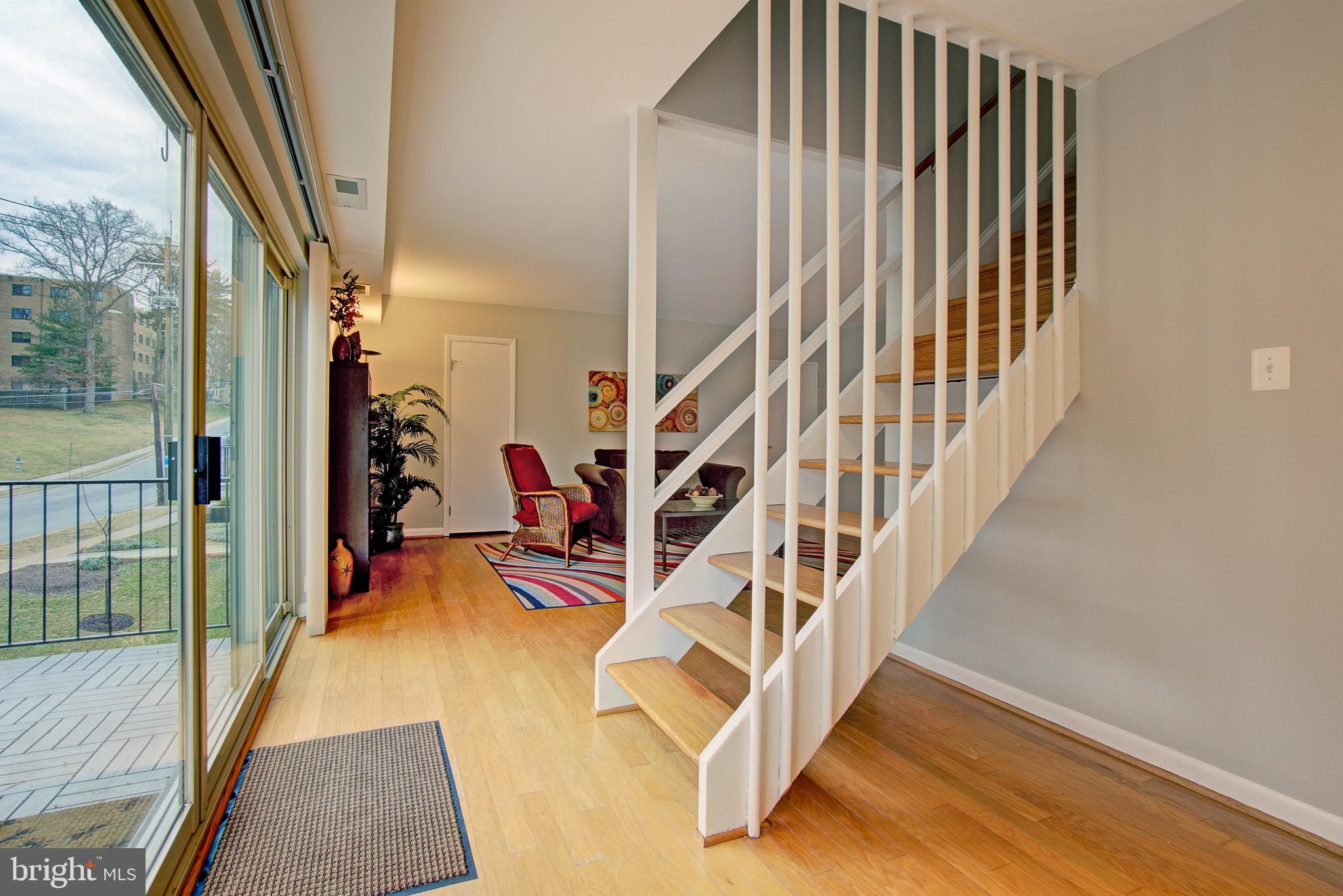 8706 Manchester Road, Unit 5 Silver Spring, MD 20901 - Photo 13 of 25 a view of entryway and hall with wooden floor