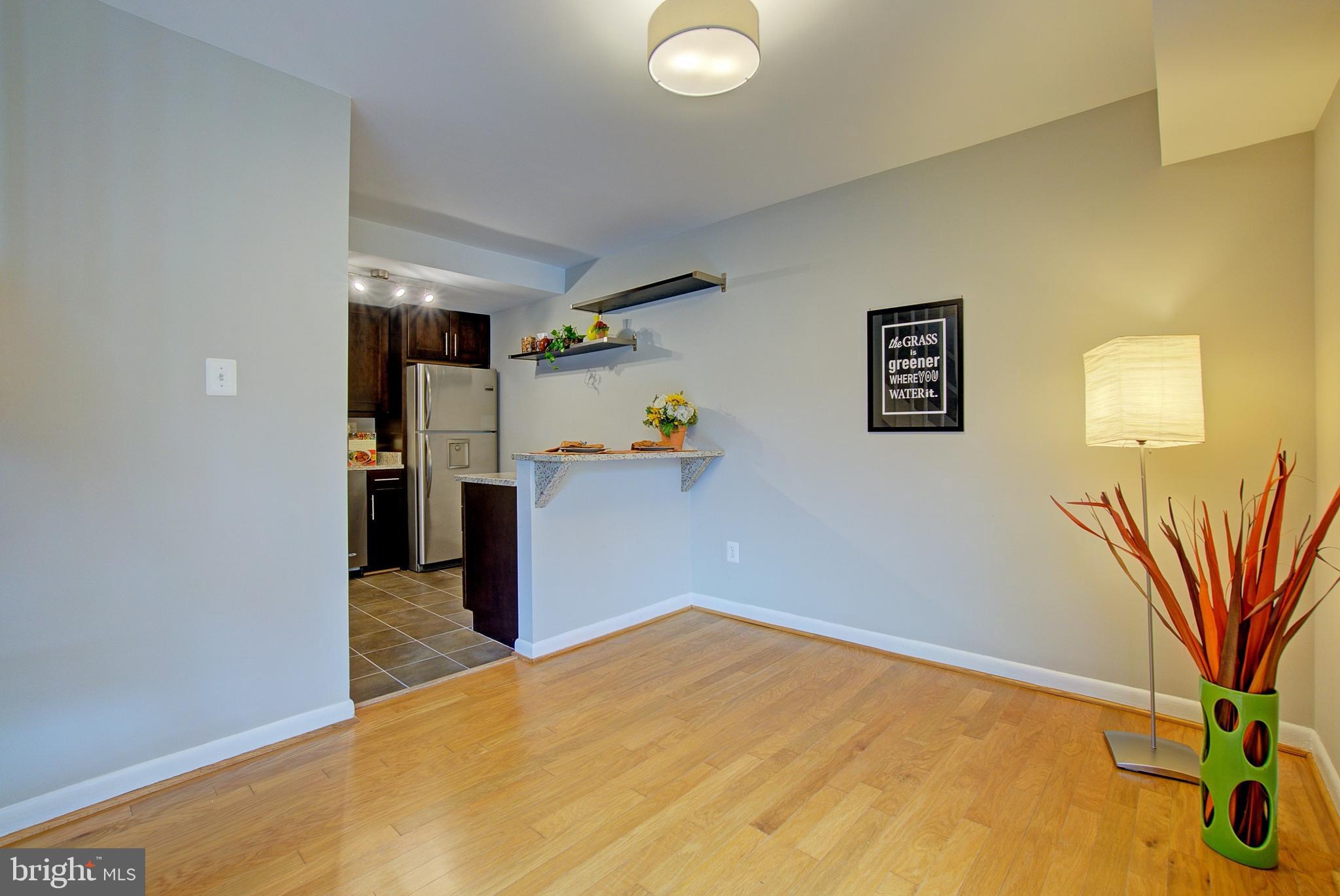 8706 Manchester Road, Unit 5 Silver Spring, MD 20901 - Photo 5 of 25 a view of a storage & utility room with a window