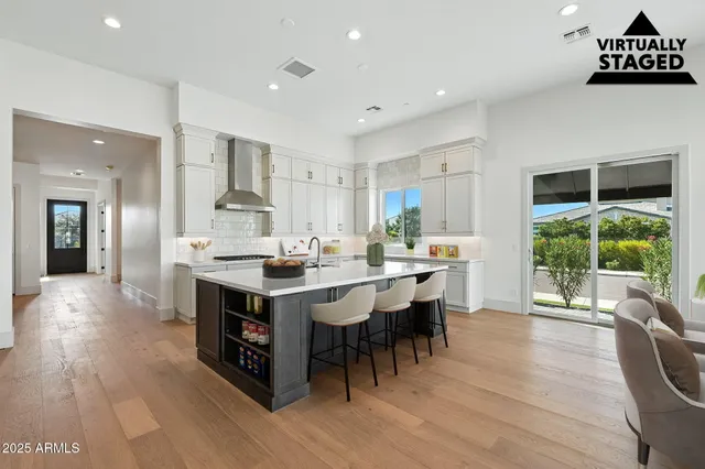 a view of room with window and wooden floor