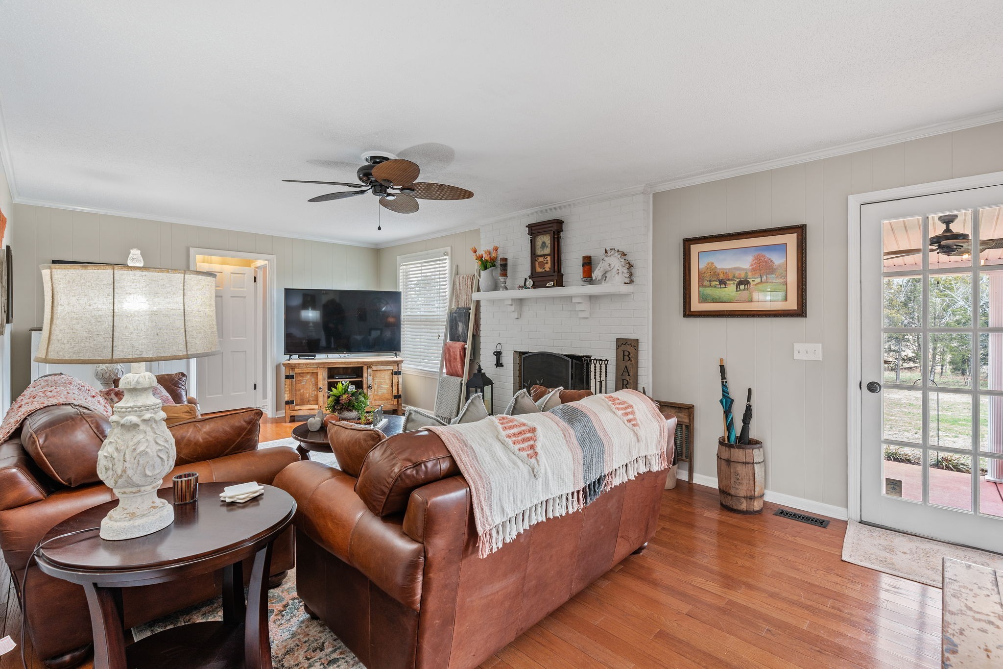 401 Bluegrass Court Lebanon, TN 37090 - Photo 11 of 51 a living room with furniture a fireplace and a flat screen tv