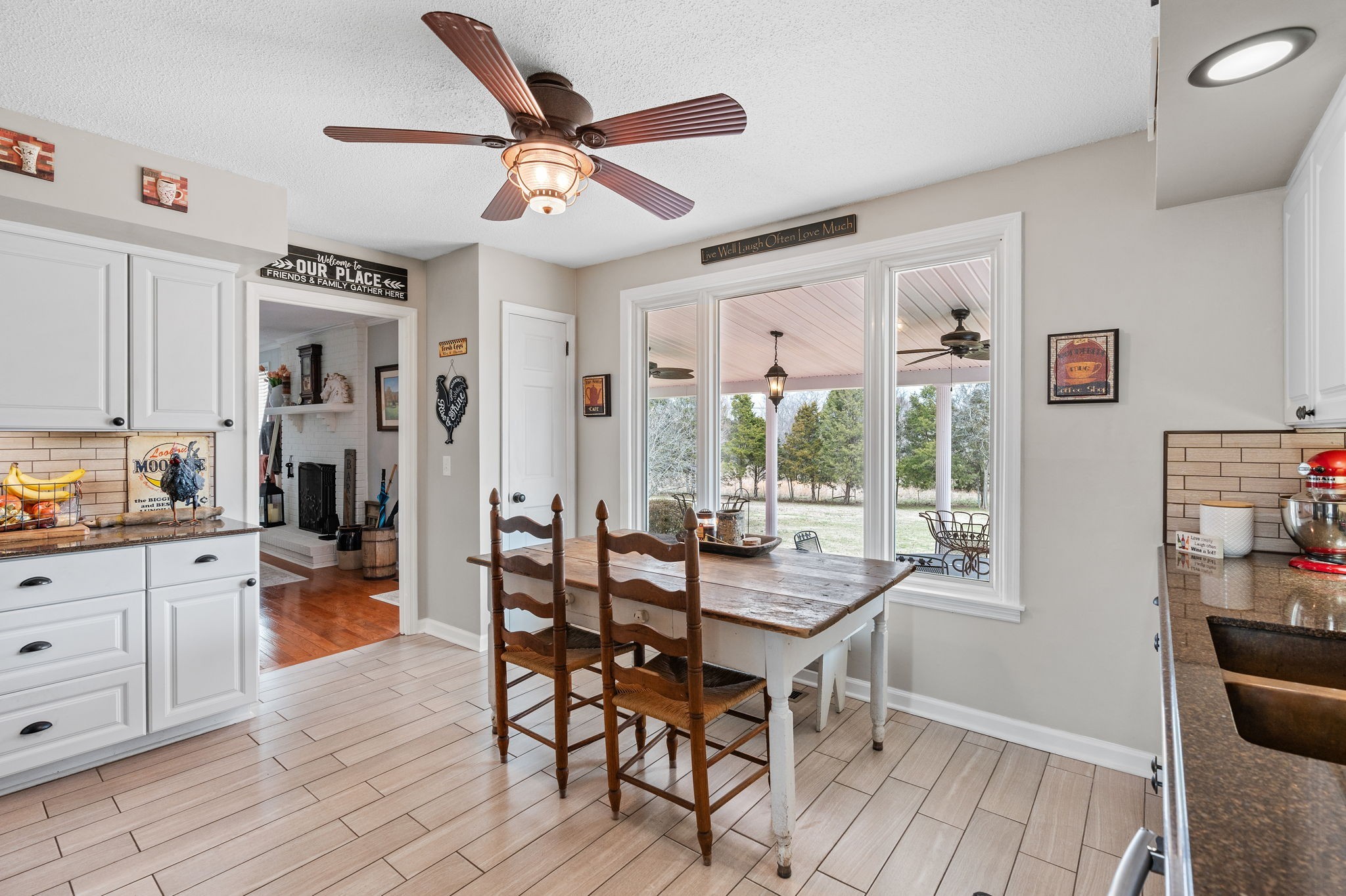 401 Bluegrass Court Lebanon, TN 37090 - Photo 14 of 51 a dining room with wooden floor and a window