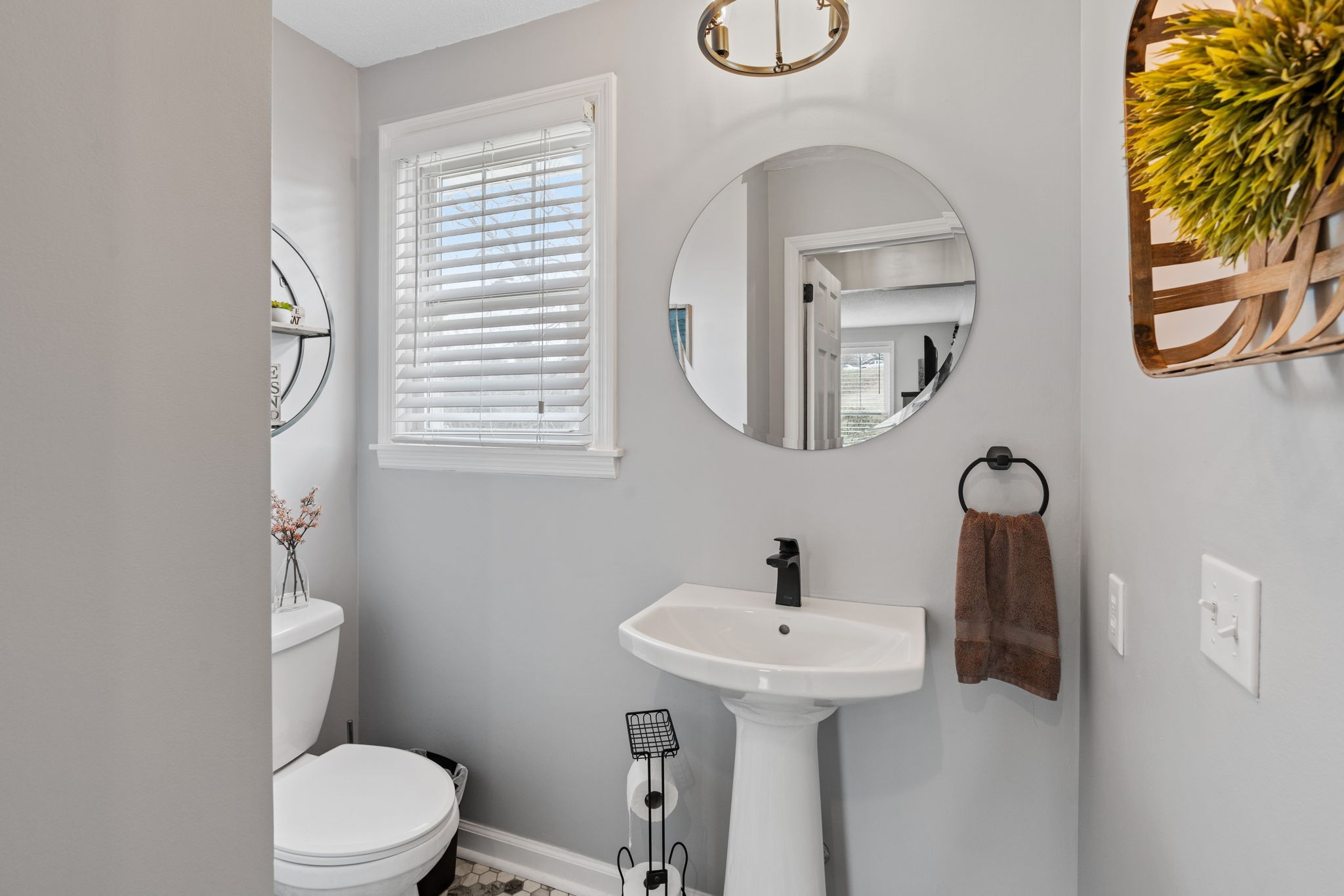 401 Bluegrass Court Lebanon, TN 37090 - Photo 18 of 51 a bathroom with a toilet sink and mirror