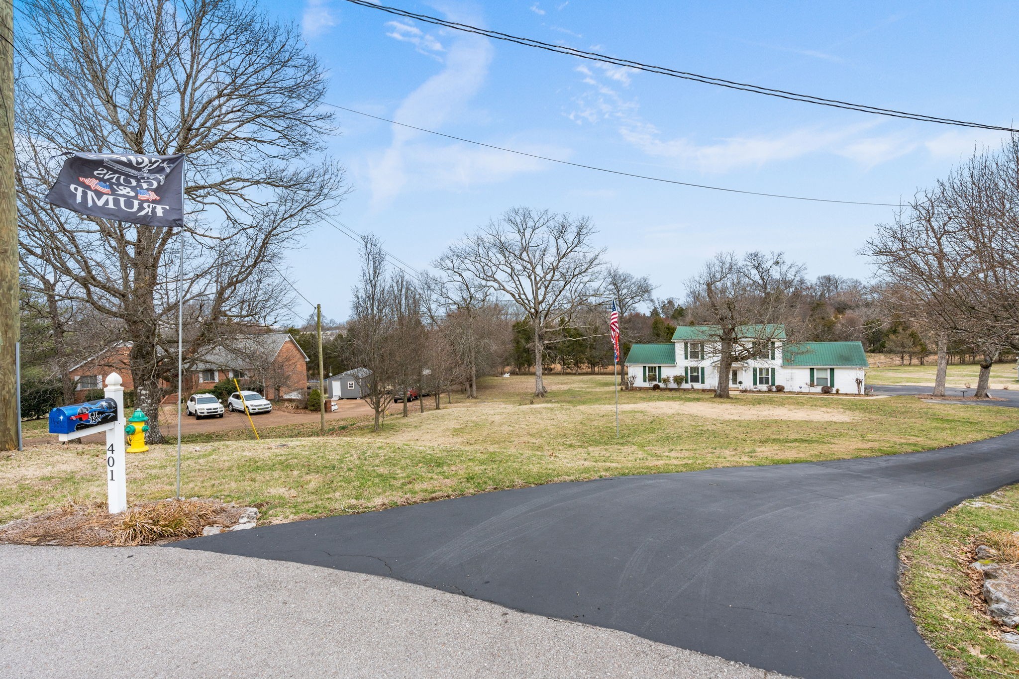 401 Bluegrass Court Lebanon, TN 37090 - Photo 2 of 51 a view of a yard with a large tree