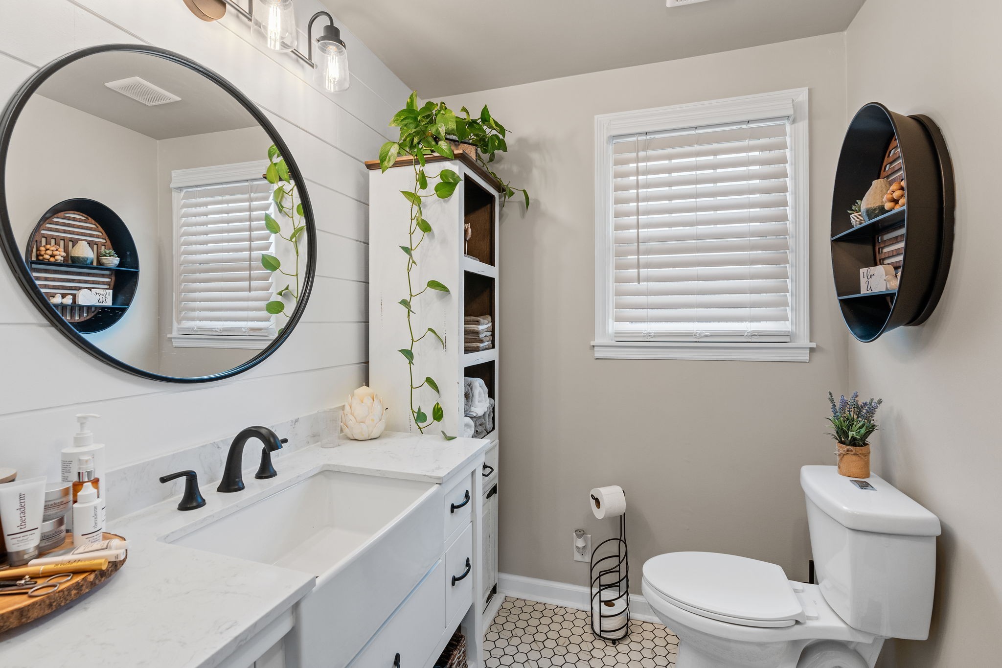 401 Bluegrass Court Lebanon, TN 37090 - Photo 23 of 51 a bathroom with a toilet sink and mirror