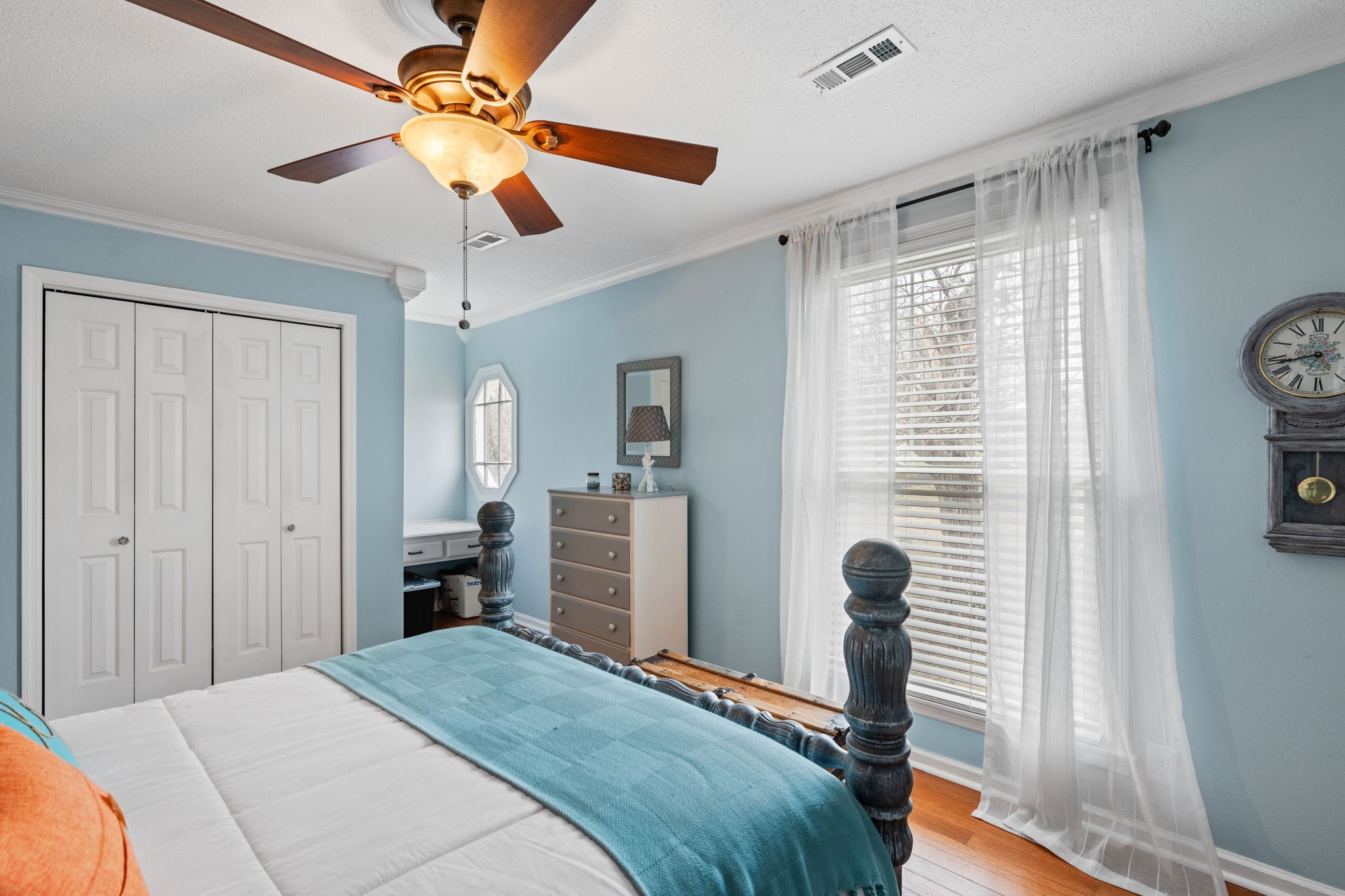 401 Bluegrass Court Lebanon, TN 37090 - Photo 26 of 51 a bedroom with a bed and a chandelier