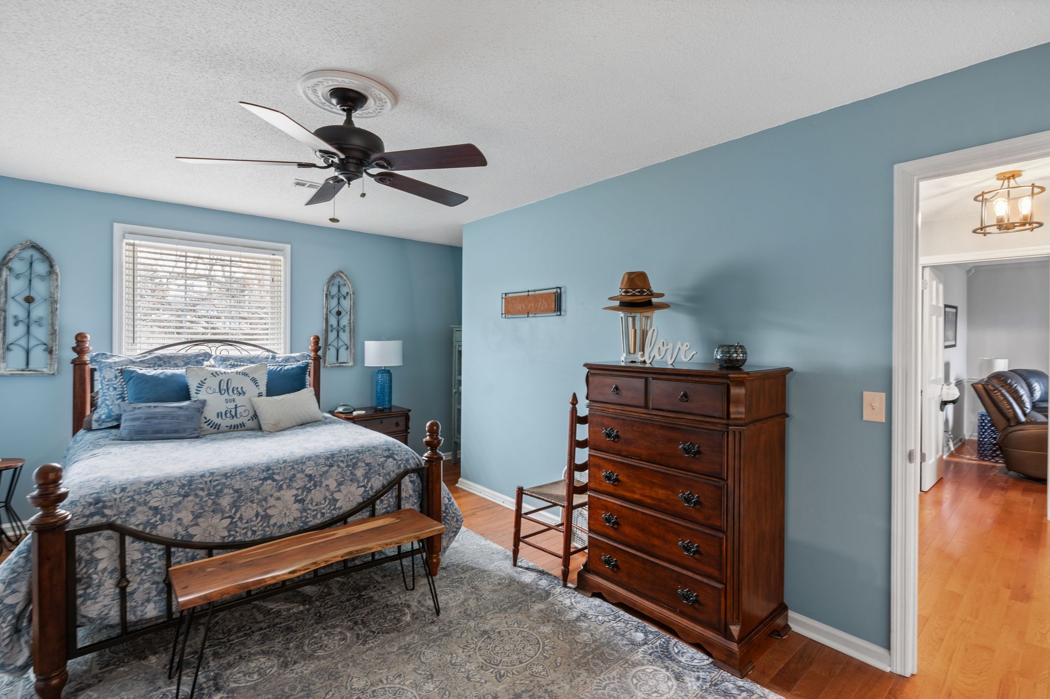 401 Bluegrass Court Lebanon, TN 37090 - Photo 29 of 51 a bedroom with a bed and a chandelier