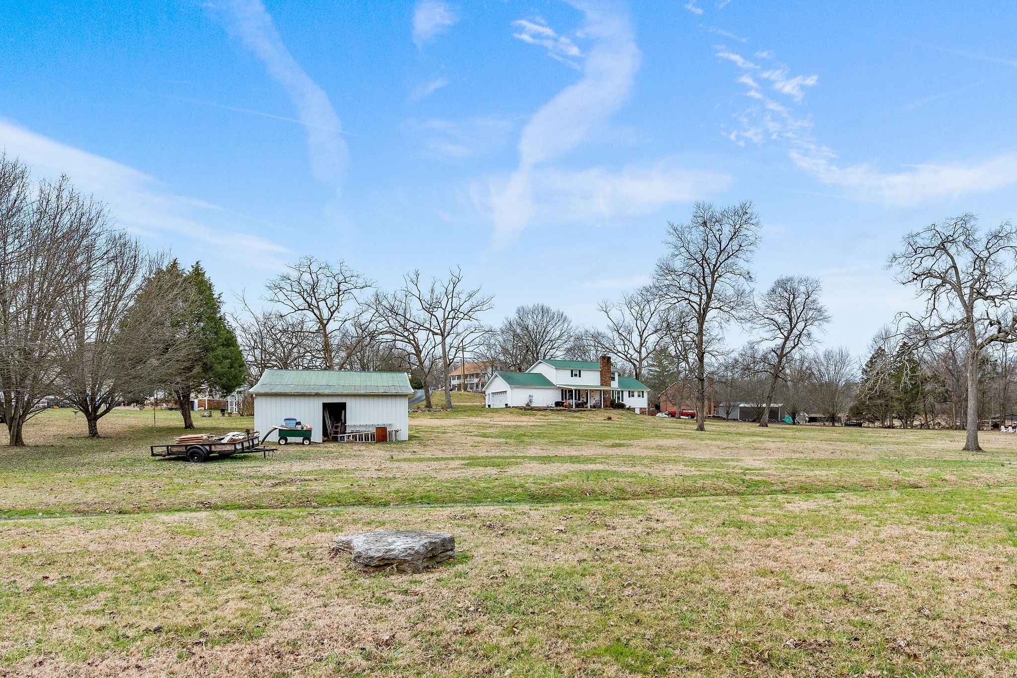 401 Bluegrass Court Lebanon, TN 37090 - Photo 39 of 51 a front view of a house with garden and trees
