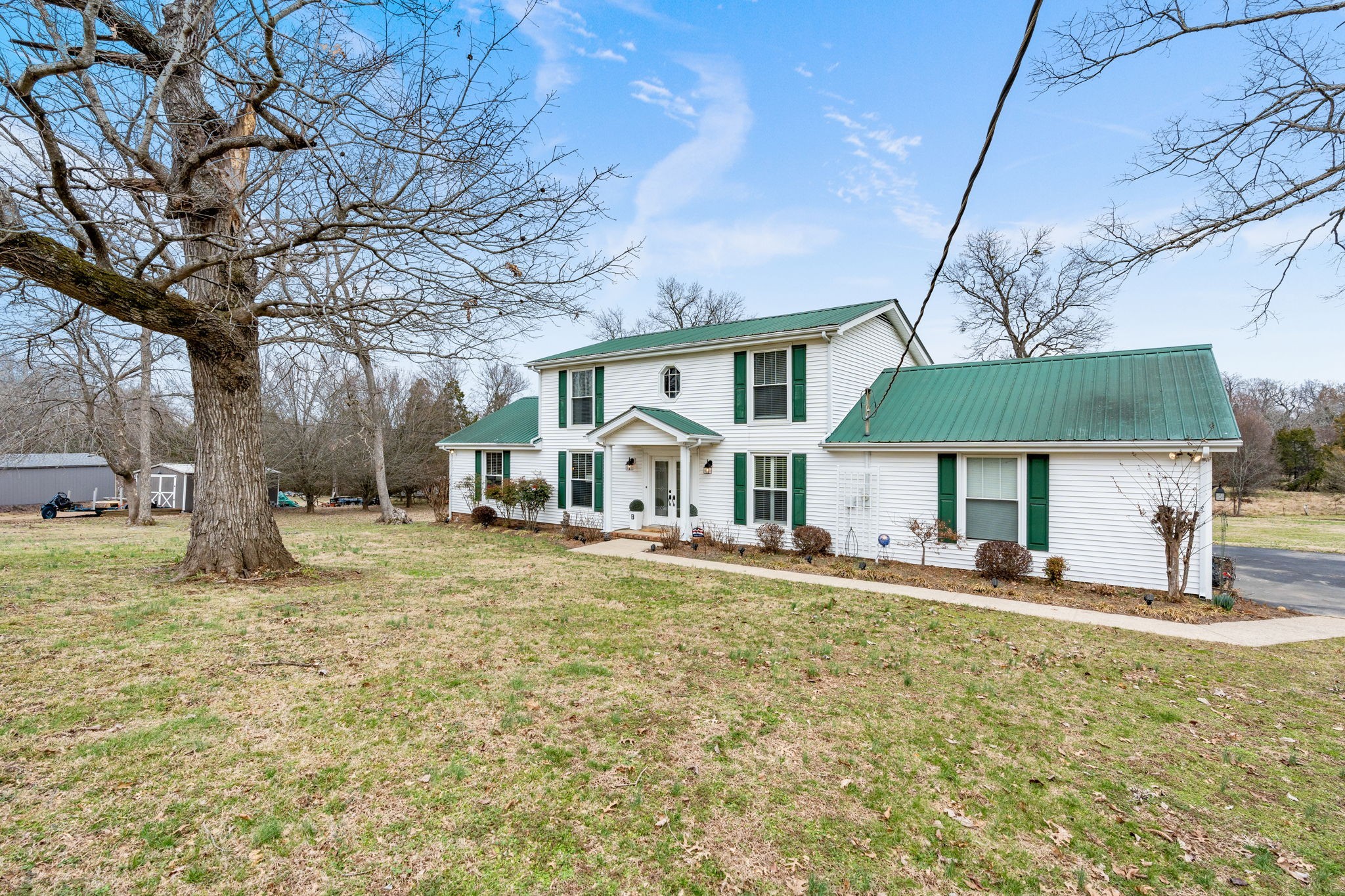 401 Bluegrass Court Lebanon, TN 37090 - Photo 4 of 51 a front view of a house with a yard
