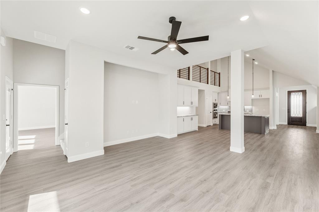 14505 Lovelace Street Pilot Point, TX 76258 - Photo 17 of 37 a view of a living room with wooden floor