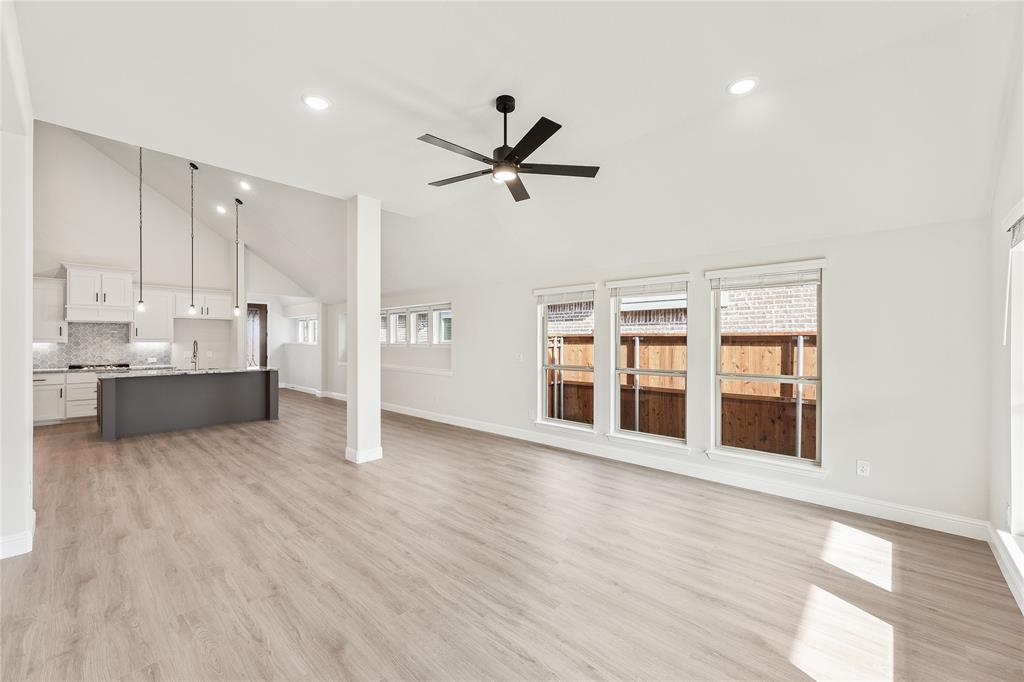 14505 Lovelace Street Pilot Point, TX 76258 - Photo 21 of 37 a view of a kitchen with wooden floor and a kitchen