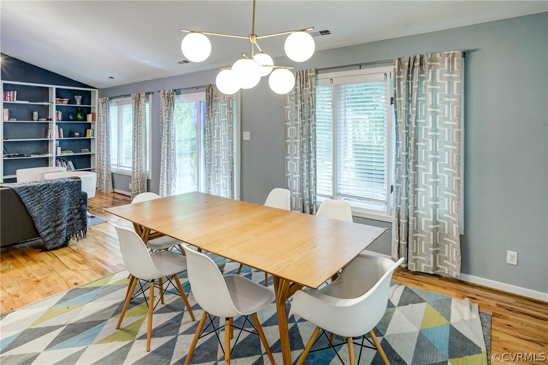 2909 Cove Ridge Trace Midlothian, VA 23112 - Photo 9 of 18 Dining room has hardwood floors and vaulted ceilin