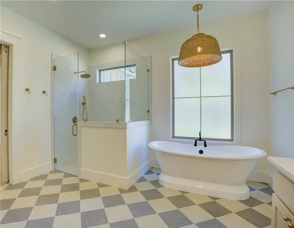 a bathroom with a sink and a shower