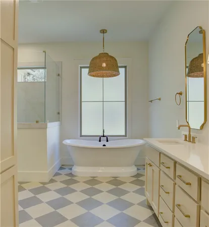 a bathroom with a sink a vanity and a mirror