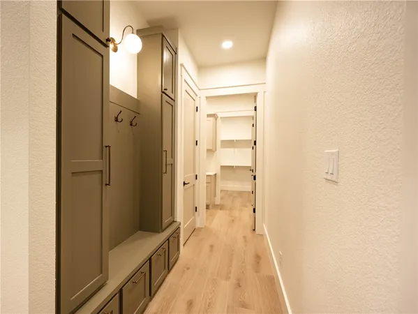 a view of a bathroom from a hallway