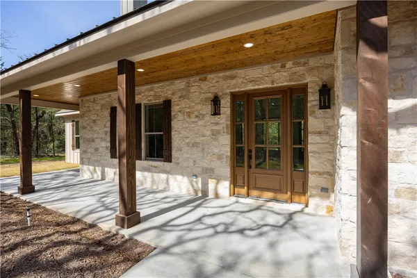 a view of a entryway door front of house
