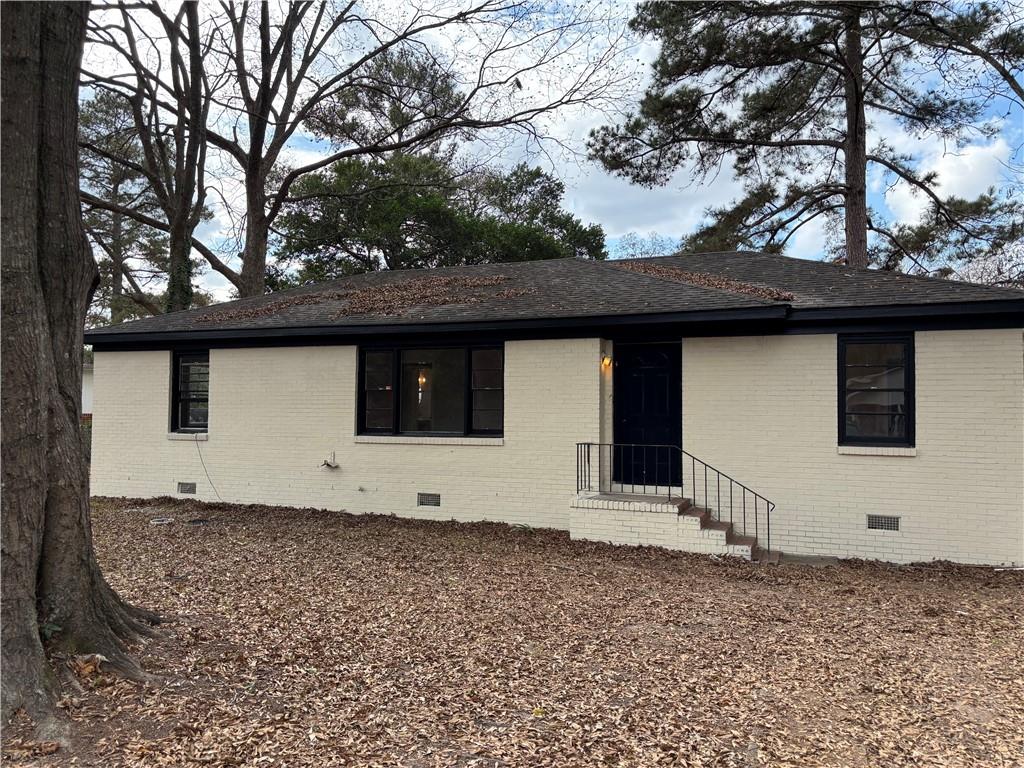 a backyard of a house with lots of green space