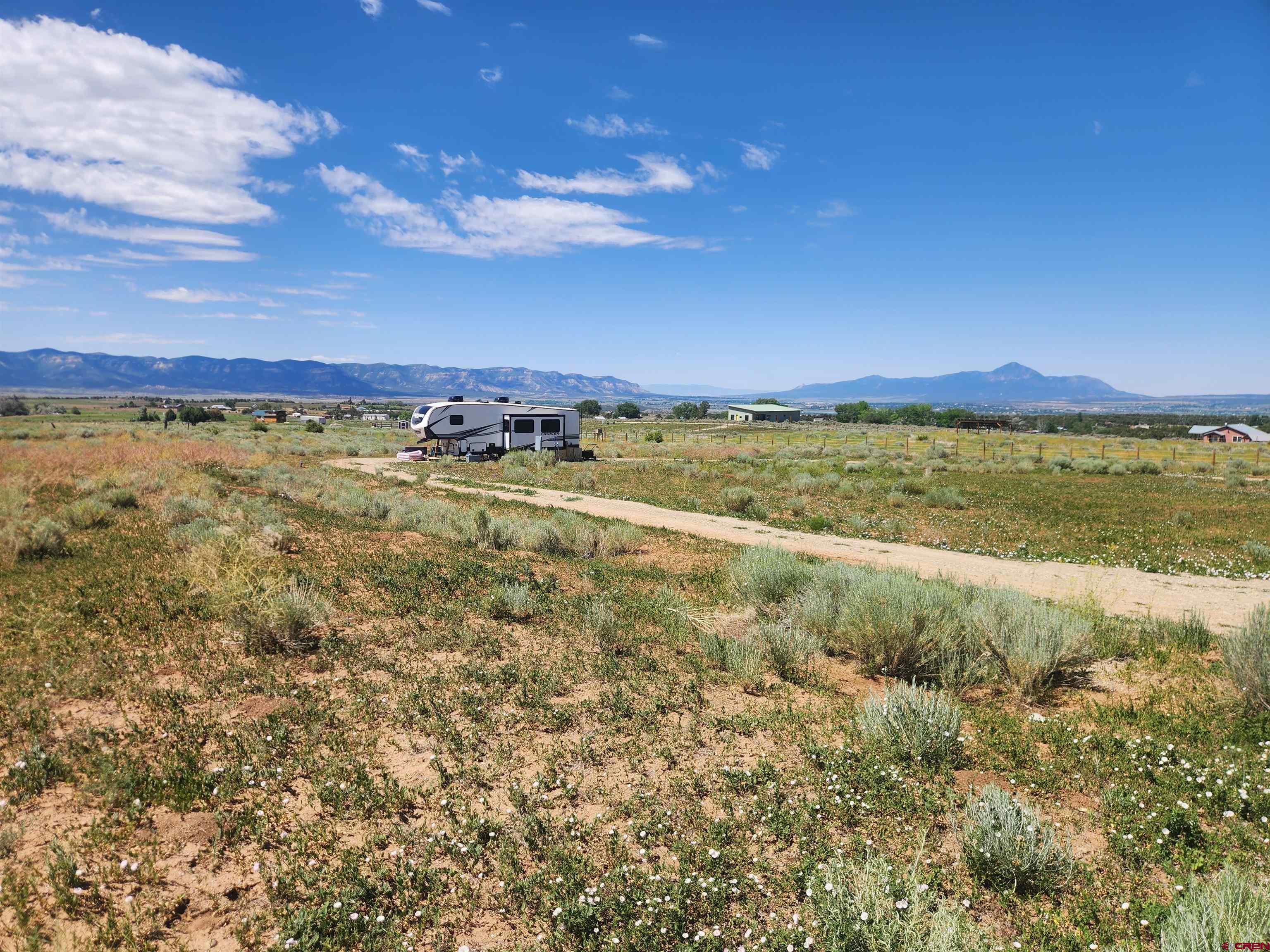 13780 32.4 Road Mancos, CO 81328 - Photo 16 of 17 a view of an ocean and a mountain