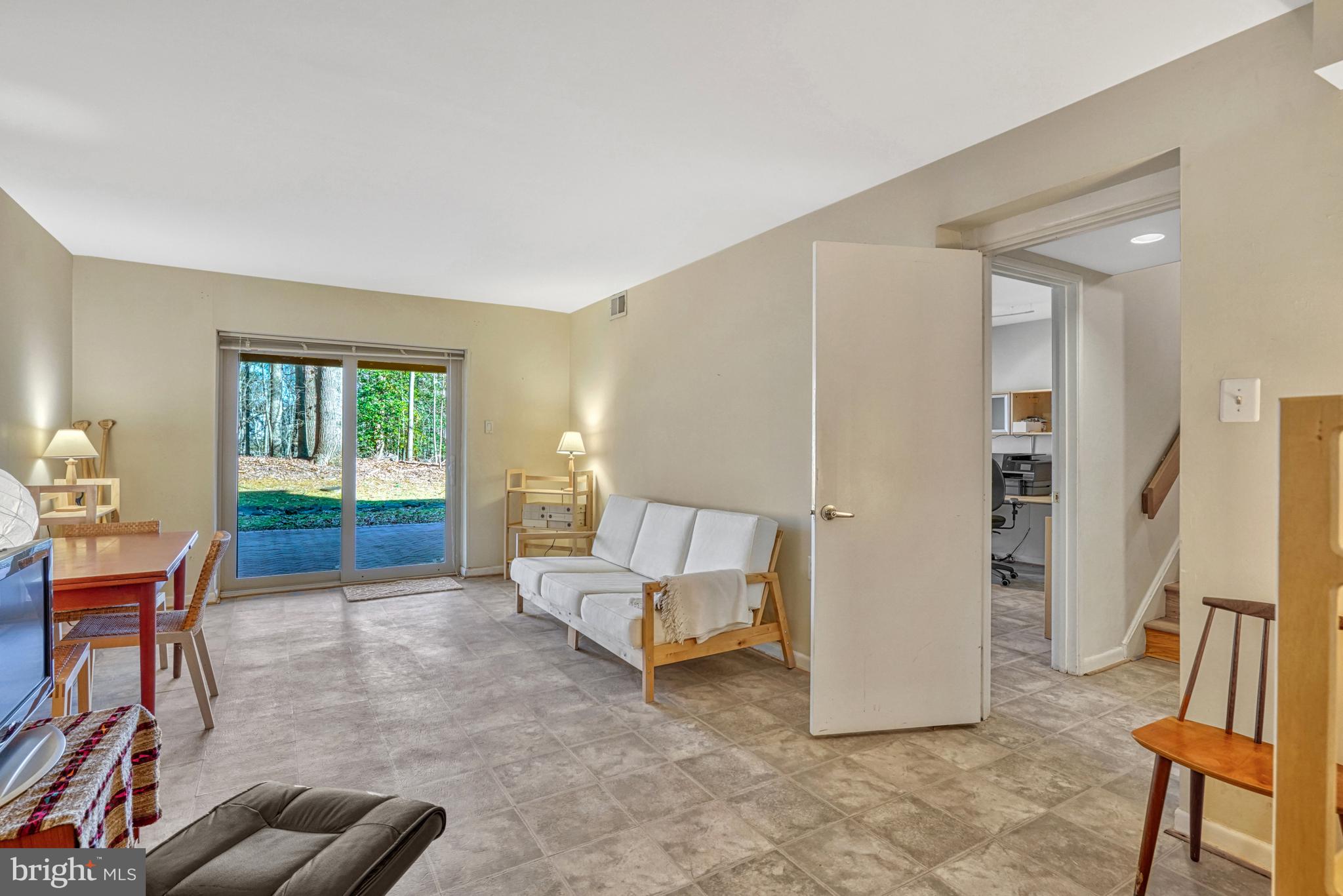1515 Inlet Court Reston, VA 20190 - Photo 40 of 51 The lower-level family room leads to the patio.
