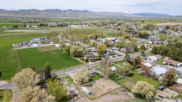 365 South Center Street Fielding, UT 84311 - Photo 38 of 41 Aerial view of residential area with a mountainous background