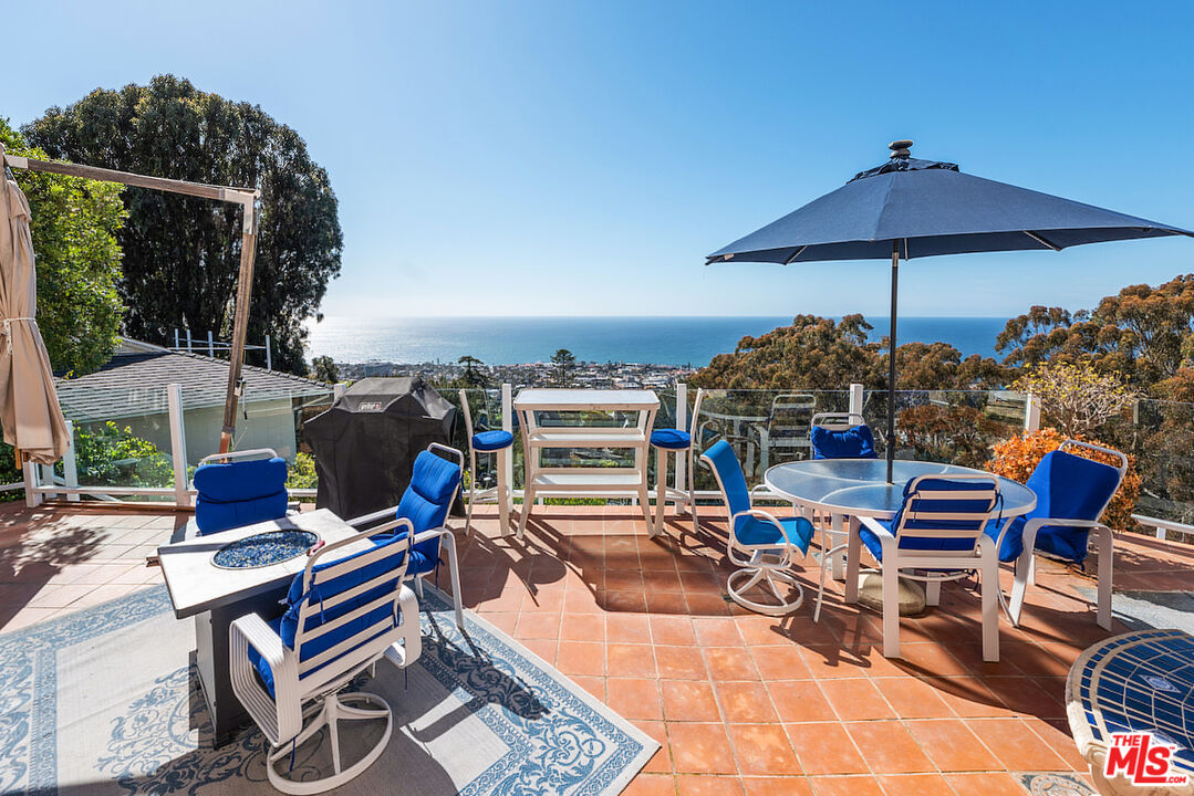 7350 Brodiaea Way La Jolla, CA 92037 - Photo 44 of 60 a outdoor view with a sitting space hardwood floor and barbeque grill