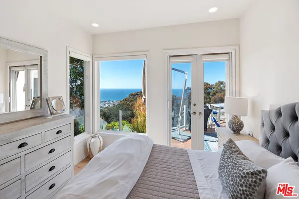 a view of a living room with a swimming pool