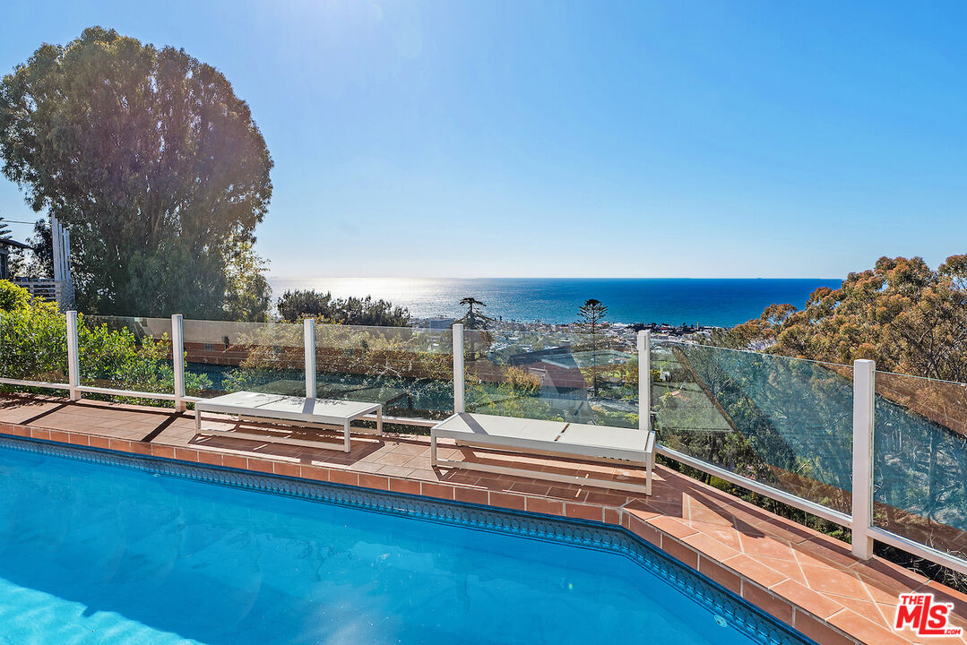 7350 Brodiaea Way La Jolla, CA 92037 - Photo 58 of 60 a view of a roof deck with couches and sky view