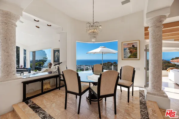 a living room with furniture fireplace and lamp