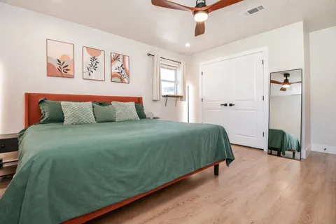 a bathroom with a bathtub and shower