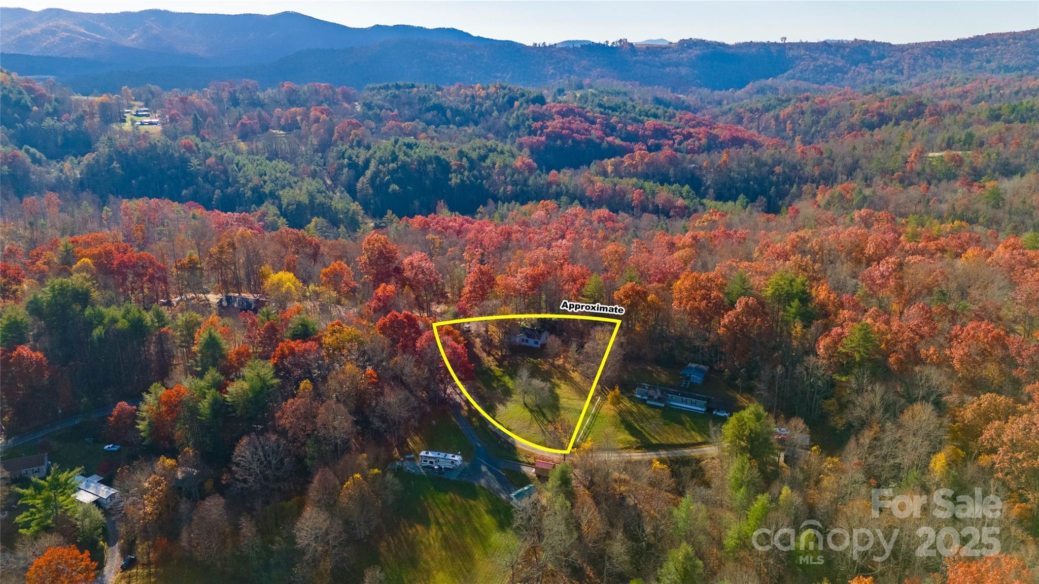 1960 Hanging Rock Road Spruce Pine, NC 28777 - Photo 22 of 47 an aerial view of a backyard