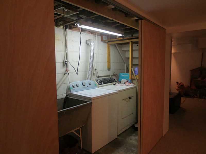 1904 Warriors Road Pittsburgh, PA 15205 - Photo 18 of 24 Other. Laundry area in game room with sliding doors.