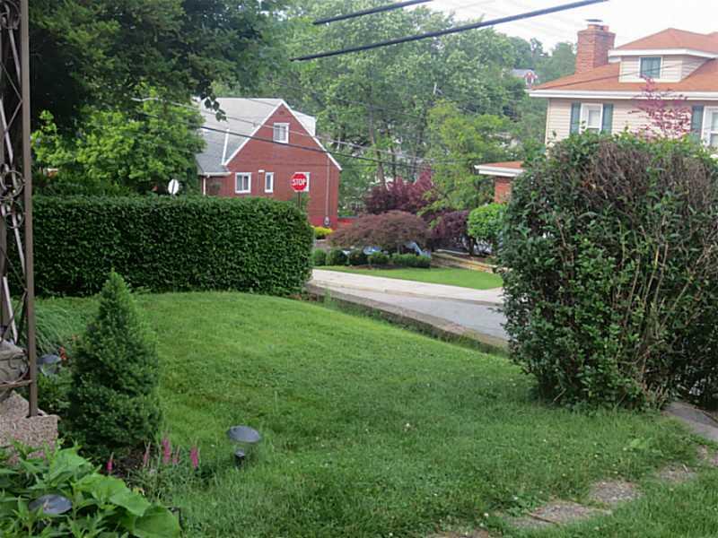 1904 Warriors Road Pittsburgh, PA 15205 - Photo 19 of 24 Exterior Front. Front yard with hedges for privacy.