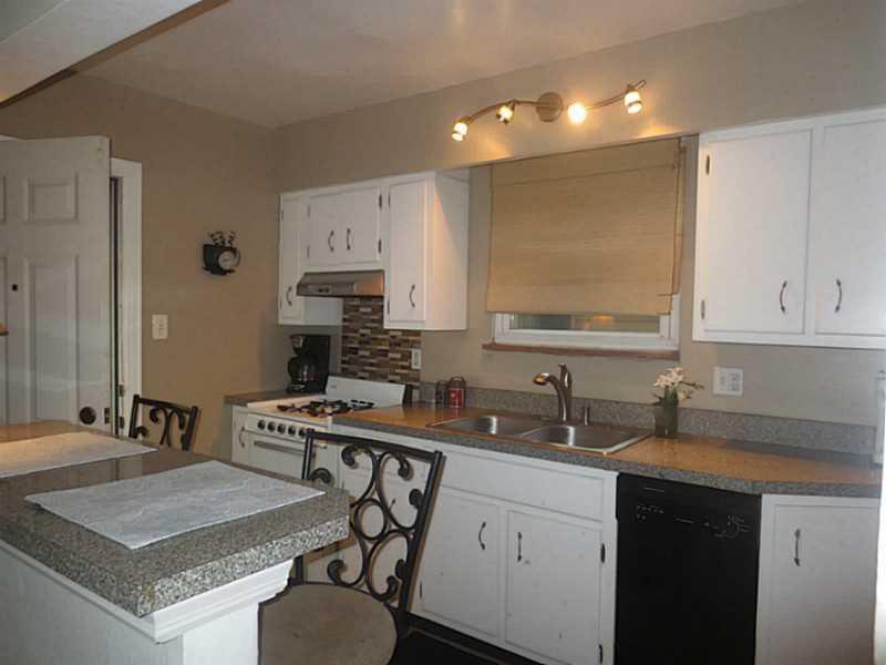 1904 Warriors Road Pittsburgh, PA 15205 - Photo 8 of 24 Kitchen. Updated kitchen with breakfast bar that opens to the dining room