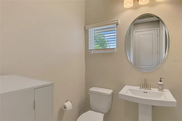 a view of an empty room with glass door