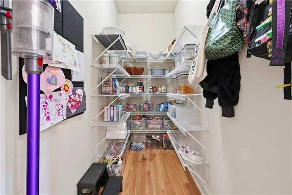a view of entryway with a lot of stuff and toys
