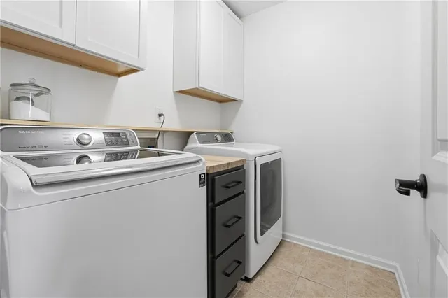 a view of a chairs and table in the patio