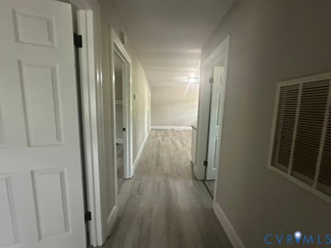 205 Hardtimes Road Farmville, VA 23901 - Photo 34 of 34 Hallway featuring wood-finish flooring, light neut