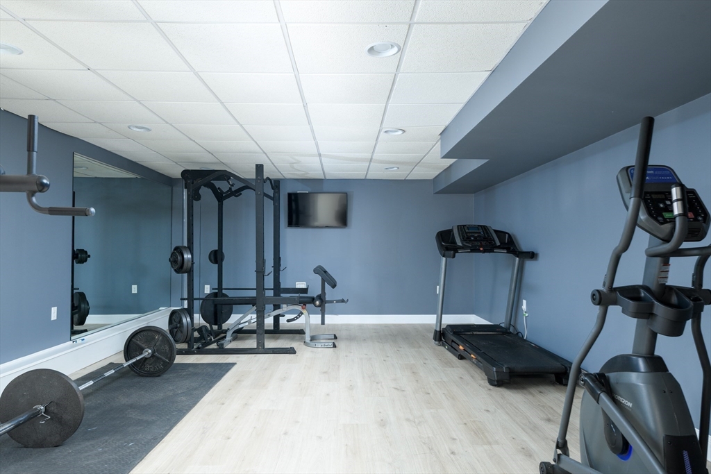 27 Vista Circle Rutland, MA 01543 - Photo 24 of 35 a view of a room with gym equipment