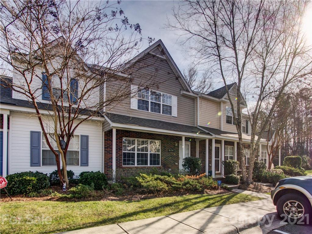 8178 Rudolph Road Charlotte, NC 28216 - Photo 2 of 20 a front view of a house with garden and plants